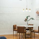 Tidy entryway with wall hooks coat rack and organized shoe bench